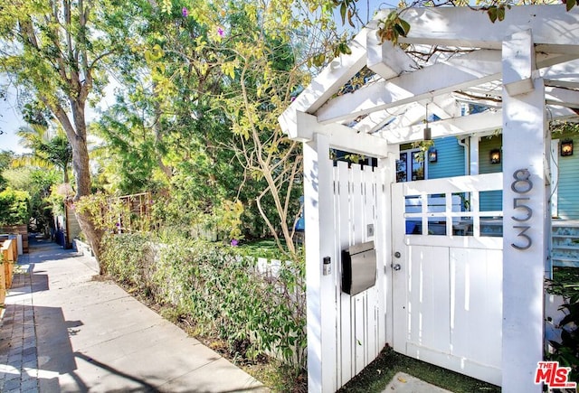 exterior space with a pergola