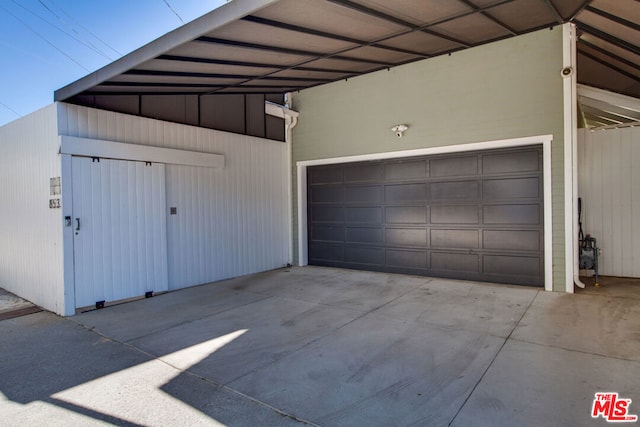 garage with a carport