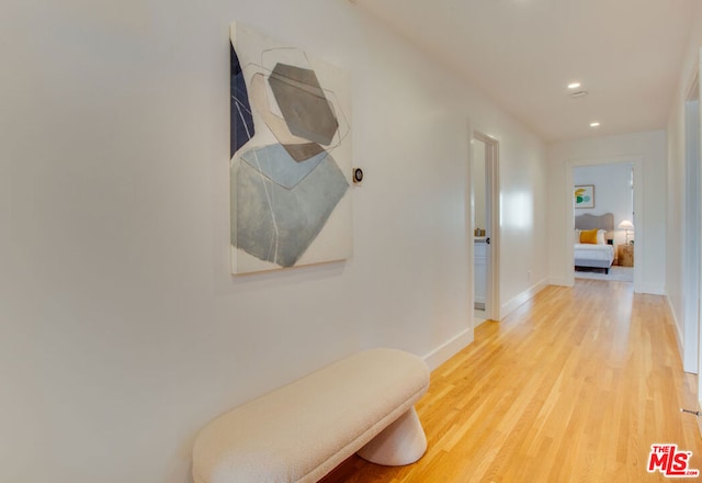 hallway featuring light hardwood / wood-style flooring