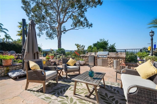 view of patio / terrace with a grill and area for grilling