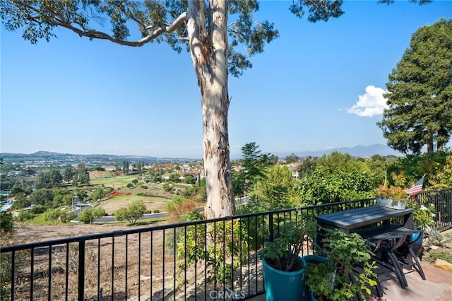 balcony featuring a mountain view