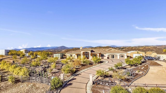 view of front of house with a mountain view