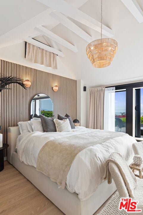 bedroom featuring an inviting chandelier, hardwood / wood-style floors, high vaulted ceiling, access to outside, and beamed ceiling