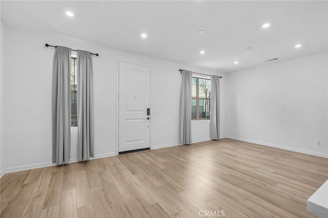 empty room featuring light hardwood / wood-style flooring