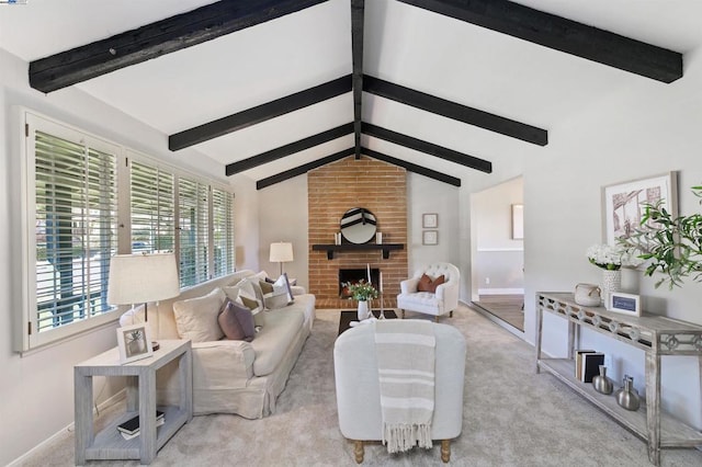 carpeted living room featuring lofted ceiling with beams and a brick fireplace