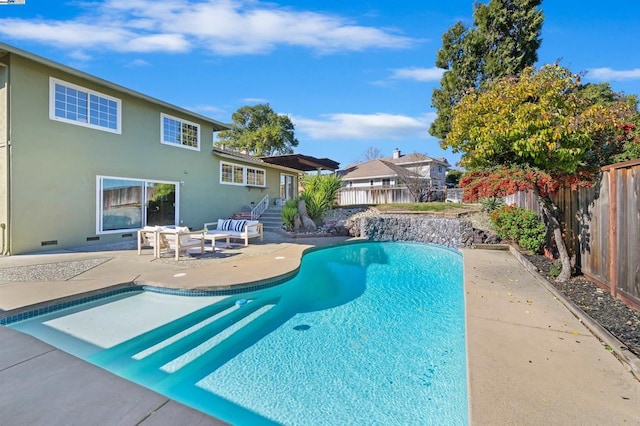 view of swimming pool featuring outdoor lounge area and a patio area