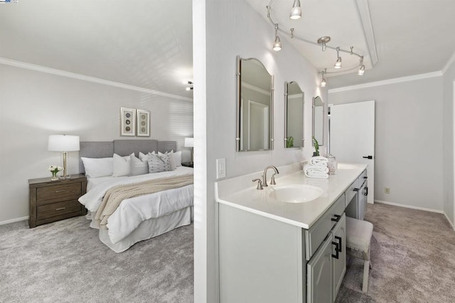 bathroom with ornamental molding and vanity