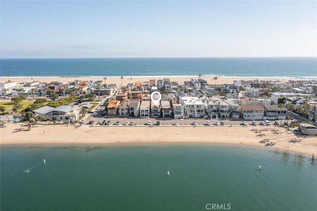 aerial view featuring a water view and a view of the beach