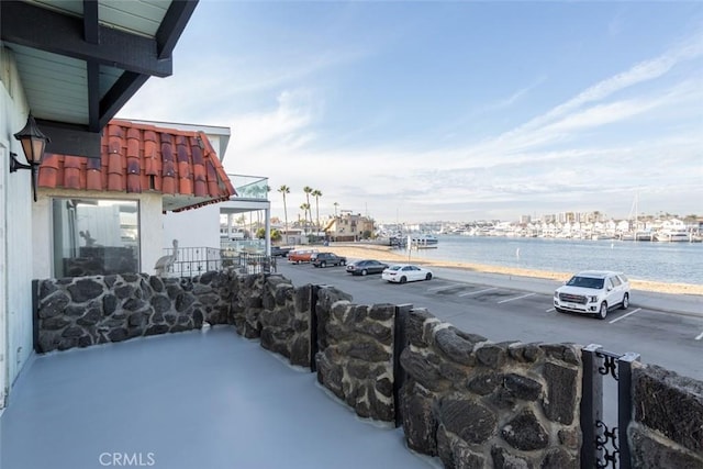 exterior space with a water view