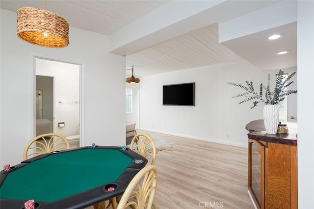 recreation room featuring light hardwood / wood-style floors