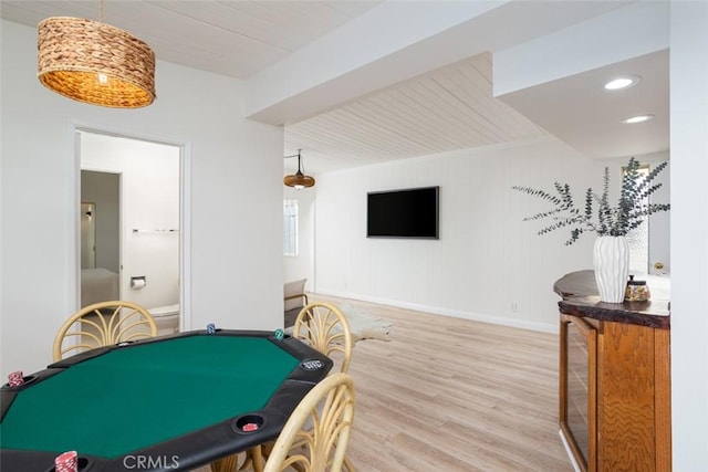 recreation room featuring recessed lighting, wood ceiling, baseboards, and wood finished floors