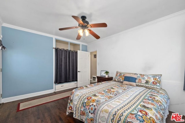 bedroom with ceiling fan, dark hardwood / wood-style flooring, and ornamental molding