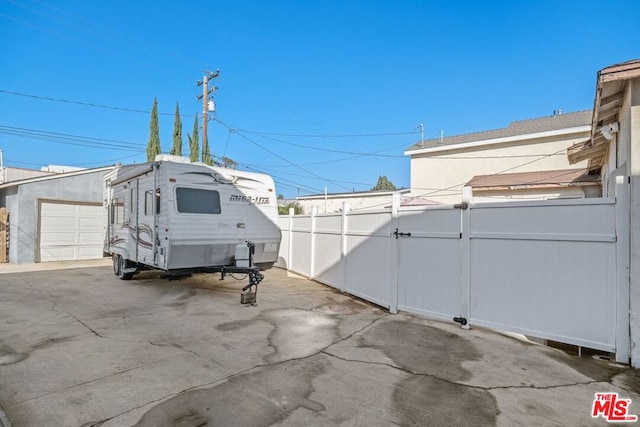 view of patio / terrace with a garage