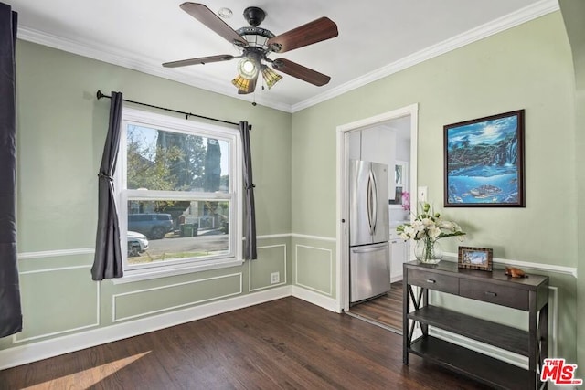 interior space featuring crown molding, dark wood-type flooring, and ceiling fan