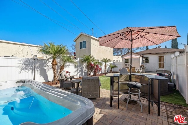 view of patio with a bar