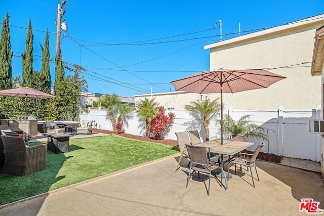 view of patio / terrace with exterior kitchen