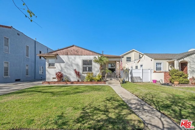 view of front of home with a front lawn