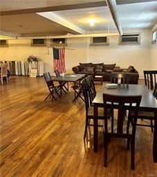 dining space with dark hardwood / wood-style floors