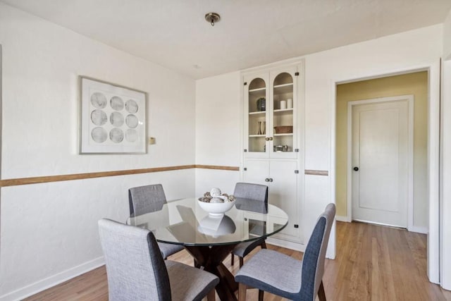 dining area featuring light hardwood / wood-style floors