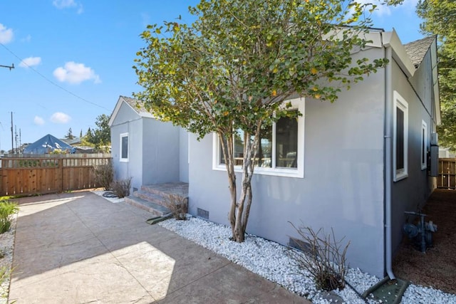 view of home's exterior featuring a patio area