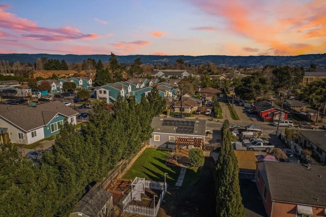 aerial view at dusk with a mountain view