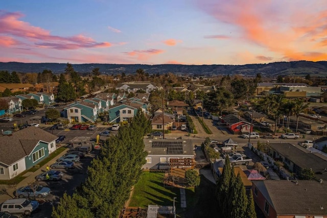 aerial view at dusk with a mountain view