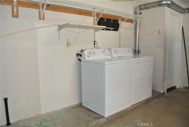 laundry area featuring separate washer and dryer