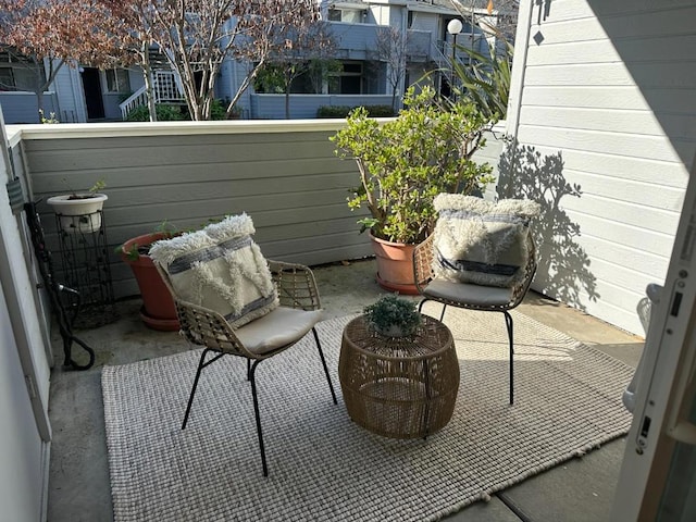 view of patio / terrace with a balcony