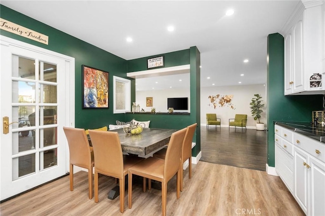 dining room with light hardwood / wood-style floors