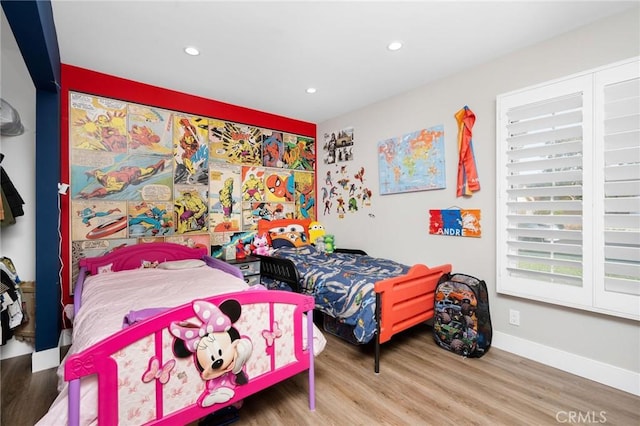 bedroom featuring hardwood / wood-style floors