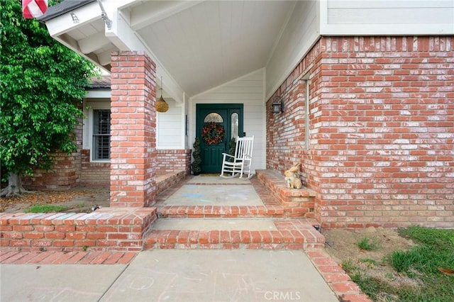 doorway to property with a porch