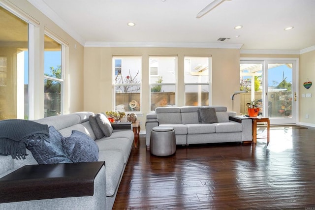 living area featuring recessed lighting, crown molding, dark wood-type flooring, and baseboards