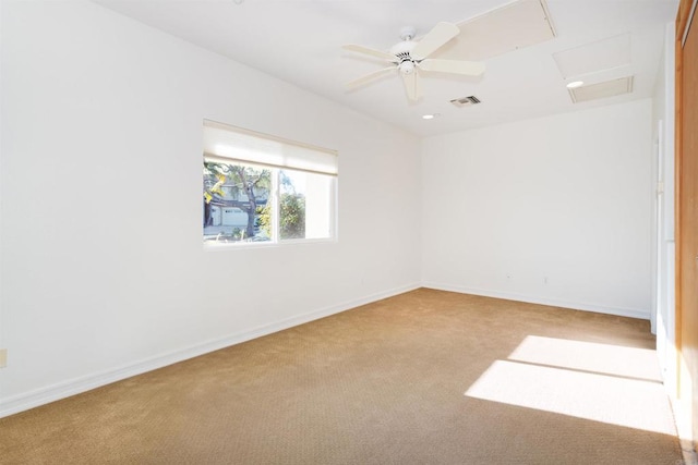 spare room featuring visible vents, recessed lighting, carpet flooring, baseboards, and ceiling fan