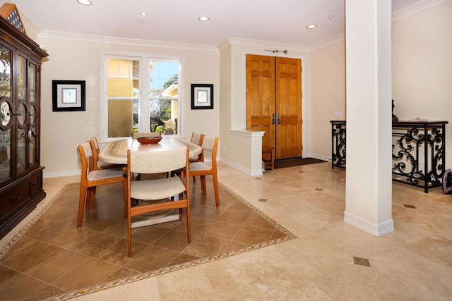 dining room featuring crown molding, decorative columns, recessed lighting, and baseboards