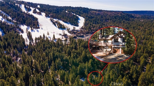 41984 Mapleleaf Dr, Big Bear Lake, CA 92315 - aerial view of property and surrounding area featuring a forest and a mountain backdrop