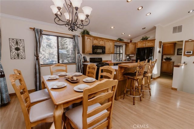 41984 Mapleleaf Dr, Big Bear Lake, CA 92315 - dining room featuring vaulted ceiling, light wood-style flooring, ornamental molding, a chandelier, and recessed lighting
