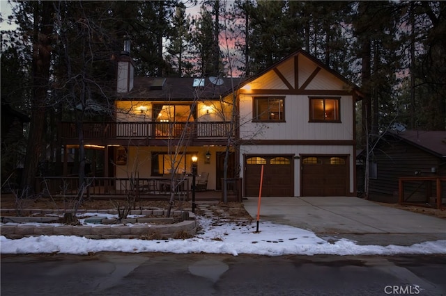 41984 Mapleleaf Dr, Big Bear Lake, CA 92315 - view of front of property with an attached garage and concrete driveway