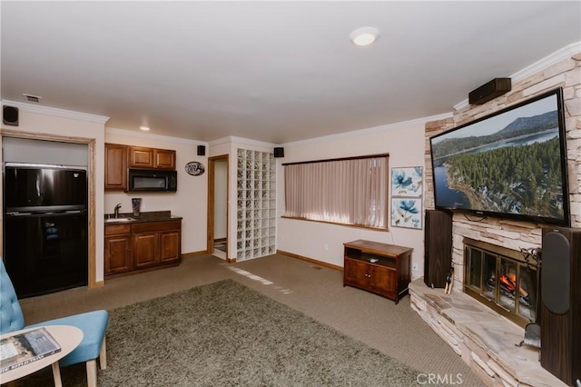 41984 Mapleleaf Dr, Big Bear Lake, CA 92315 - living room with a stone fireplace, ornamental molding, carpet, and baseboards