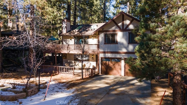 view of front of house with a balcony and a garage