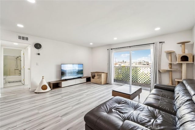 living room featuring light wood-type flooring