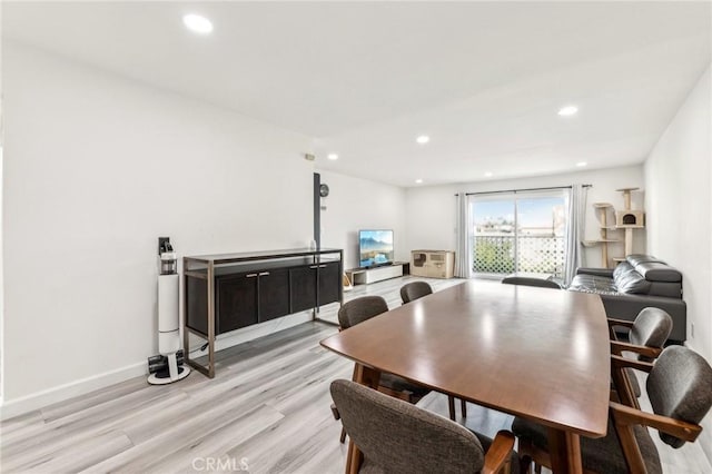 dining room featuring light hardwood / wood-style flooring