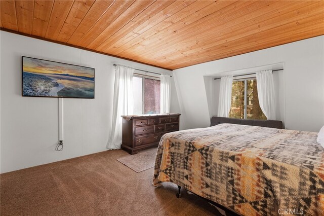 bedroom with light carpet, wood ceiling, and ornamental molding