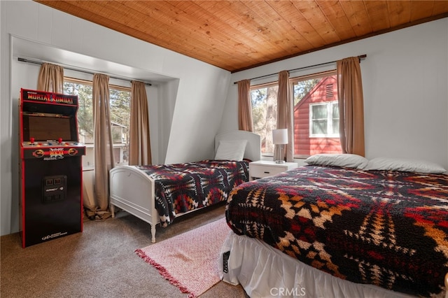 carpeted bedroom with multiple windows, ornamental molding, and wooden ceiling