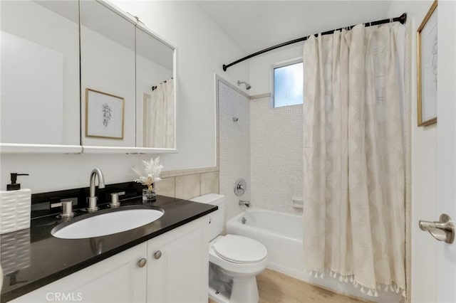 full bathroom with vanity, toilet, and shower / bathtub combination with curtain