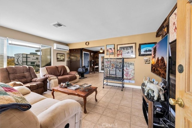 tiled living room with an AC wall unit and ceiling fan