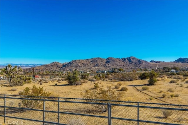 view of mountain feature featuring a rural view