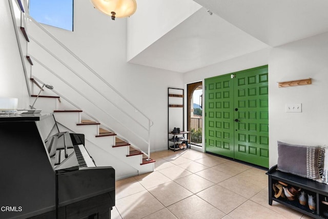 foyer featuring light tile patterned floors