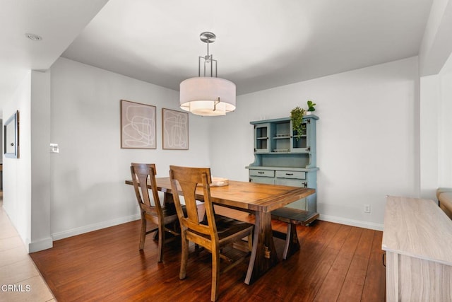 dining room featuring dark wood-type flooring