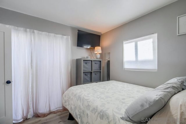 bedroom featuring hardwood / wood-style floors