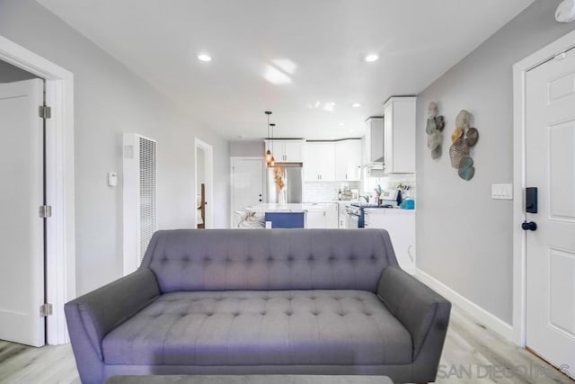 living room featuring light hardwood / wood-style flooring